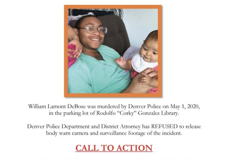 Smiling man holding baby on justice flyer